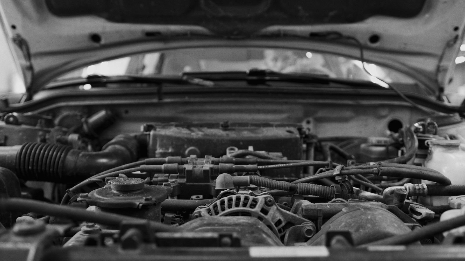 Engine bay of a modern car, with the radiator and cooling components