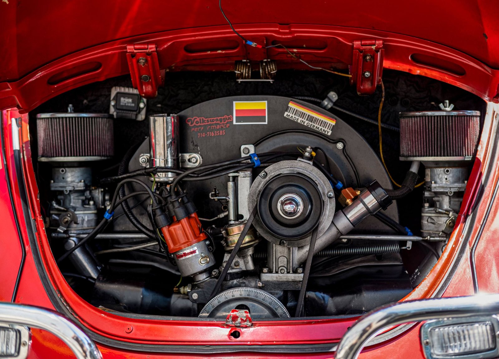 Red Volkswagen Beetle engine bay