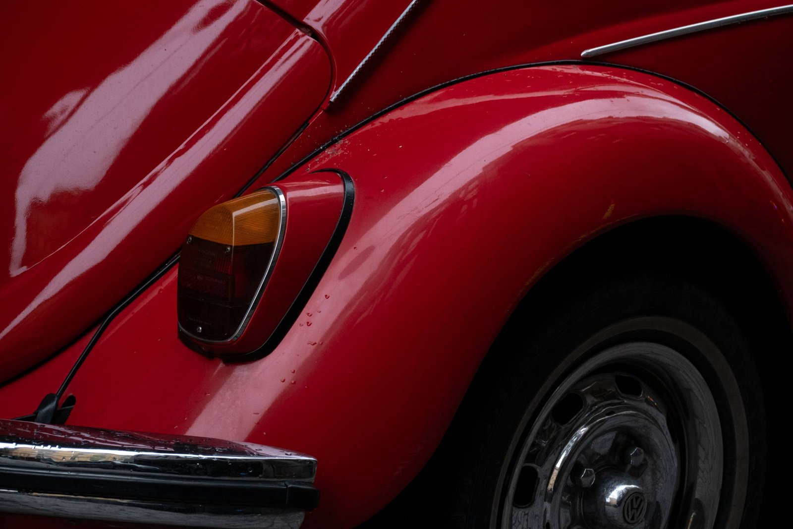 Red Volkswagen Beetle body panel and taillight